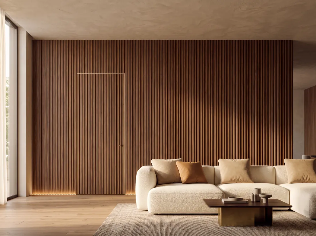 Fluted walnut feature wall with an integrated flush door