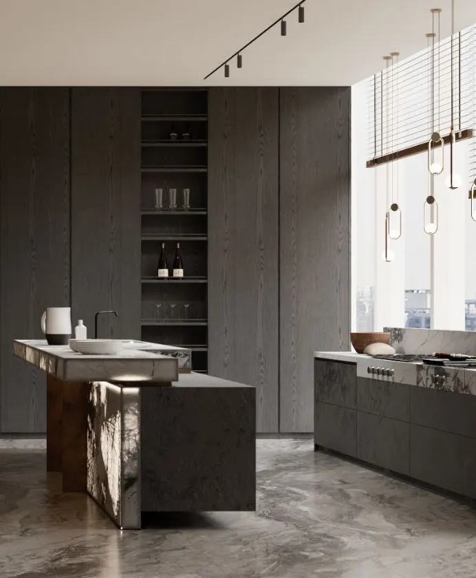 Dark kitchen with stone island and tall cabinets